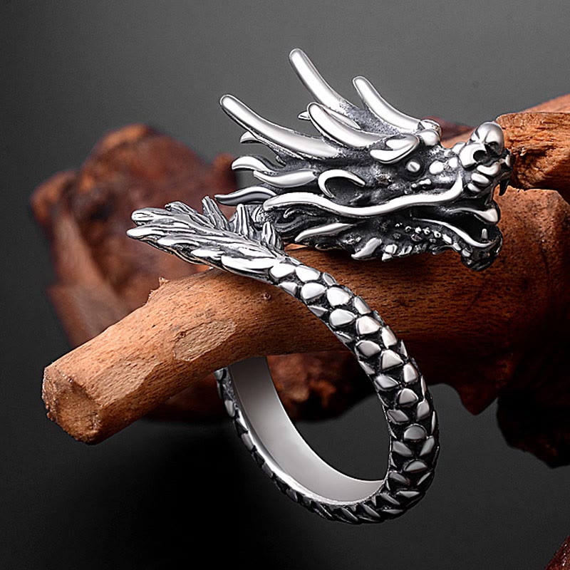Sterling Silver Dragon Ring - oxidized silver dragon head resting on driftwood, scale texture, protective