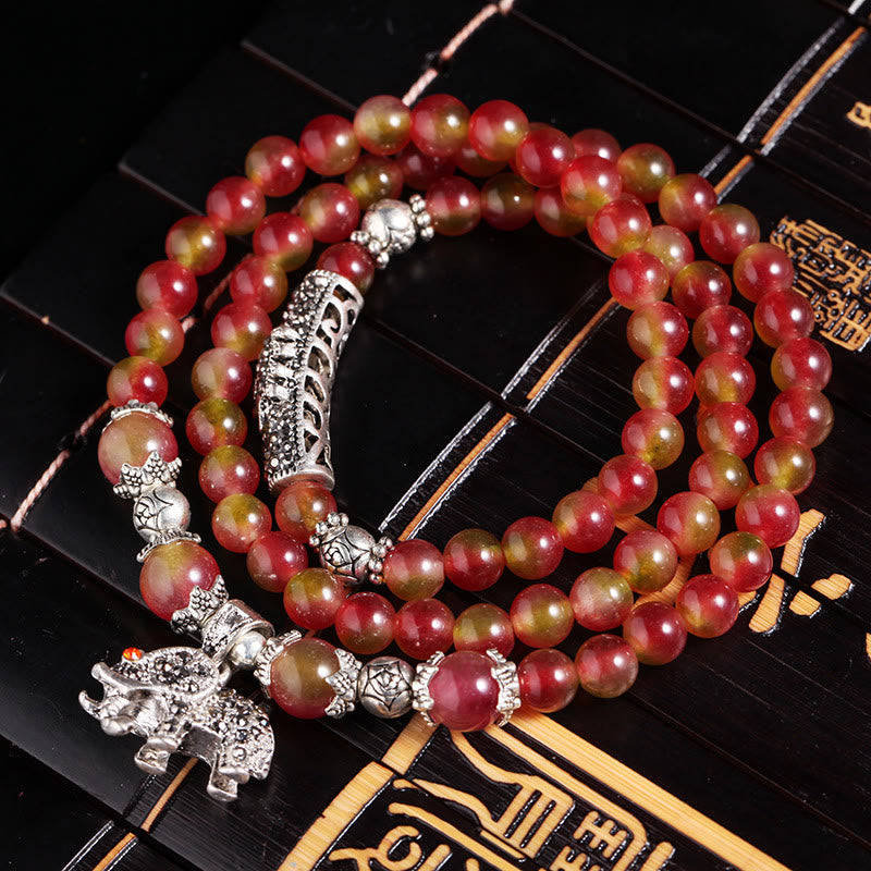 Watermelon Tourmaline Bracelet – On black bamboo mat with silver elephant tube and PiXiu