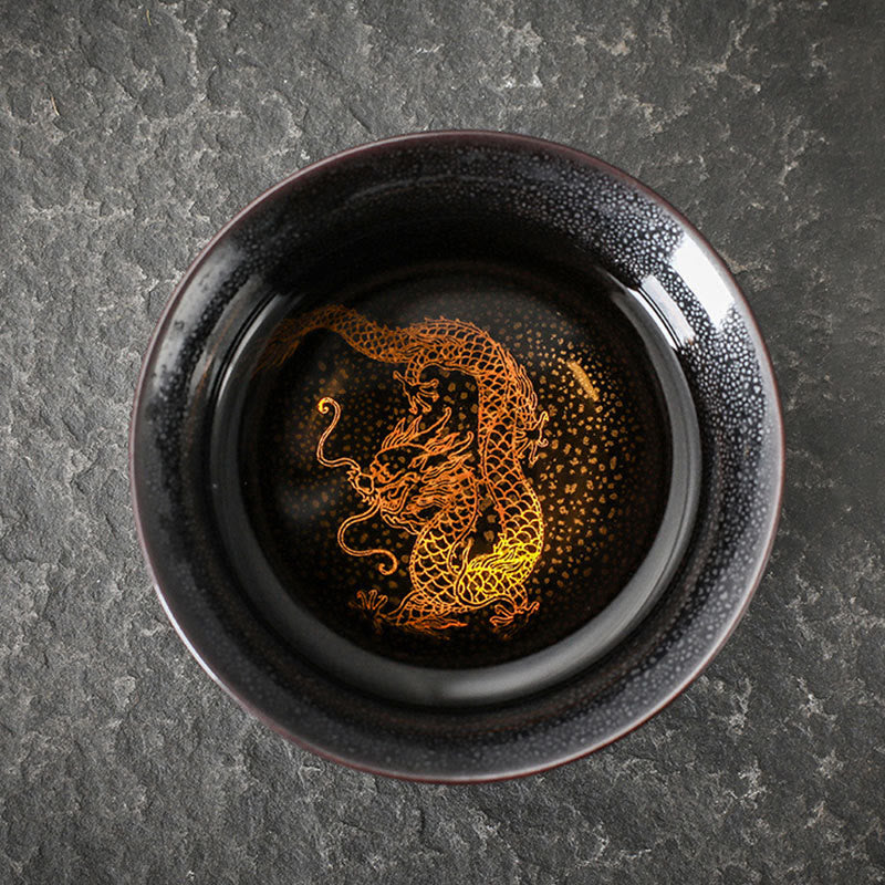 Gold Leaf Jianzhan Teacup – Front view of tenmoku bowl with gold leaf koi design, kung fu tea cup