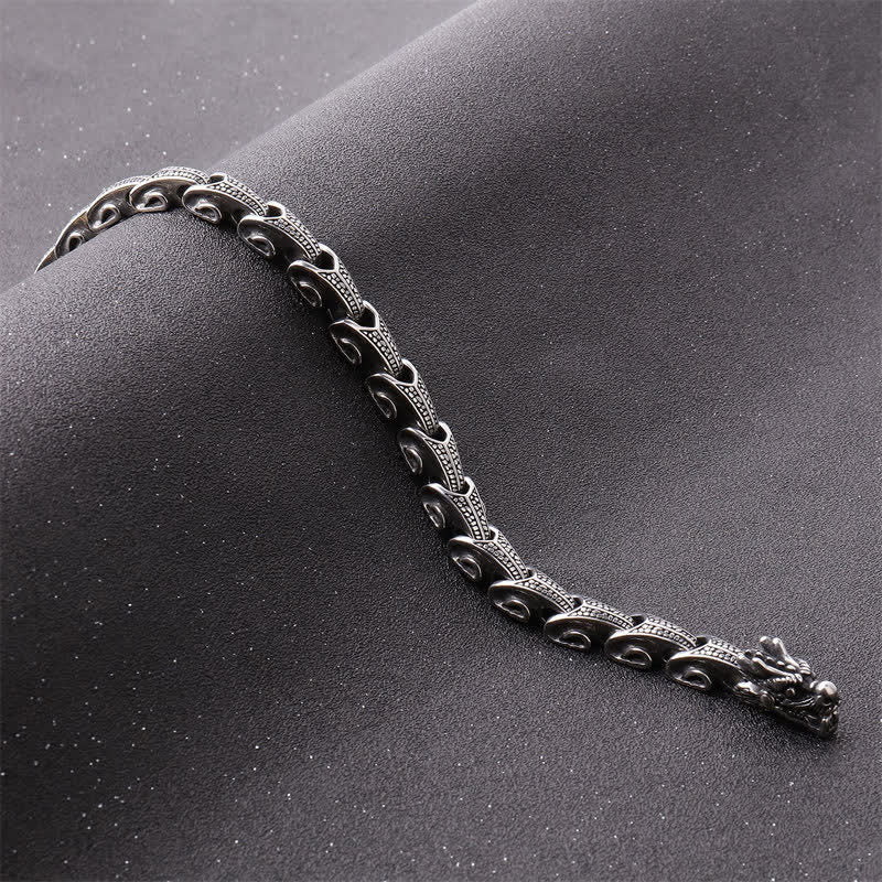Dragon Necklace Bracelet Set - Scaled dragon bracelet on dark textured fabric, Protection