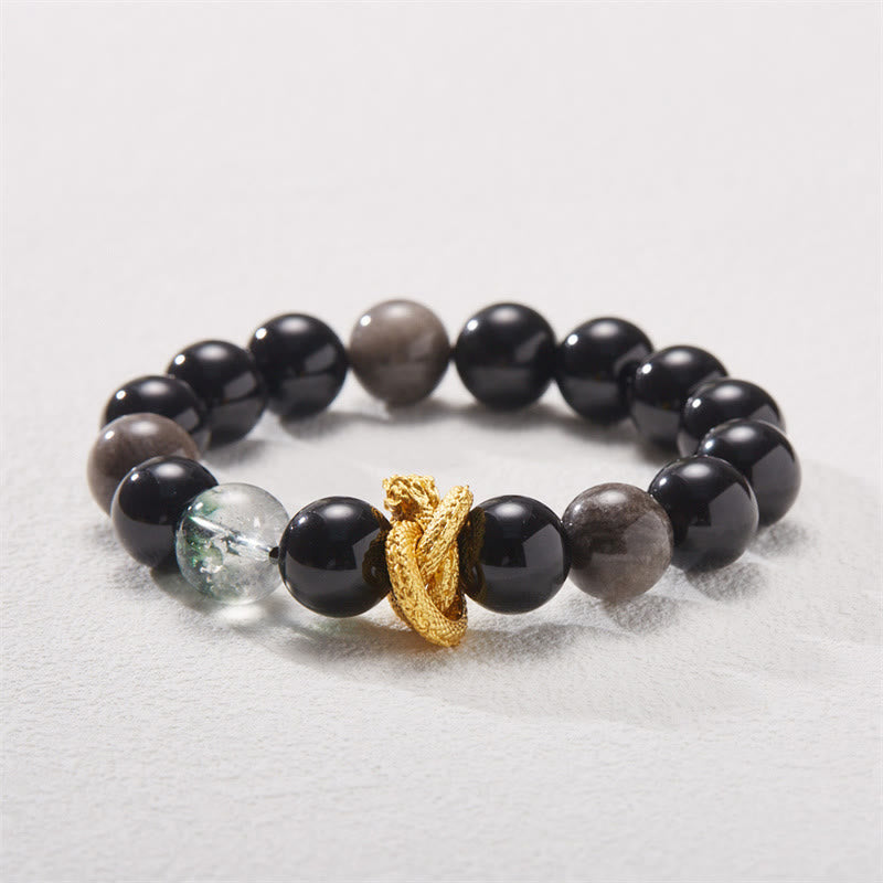 Silver Sheen Obsidian Dragon Bracelet – Three-quarter view with translucent gray beads and coiled gold dragon, shielding