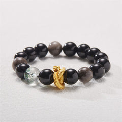 Silver Sheen Obsidian Dragon Bracelet – Three-quarter view with translucent gray beads and coiled gold dragon, shielding