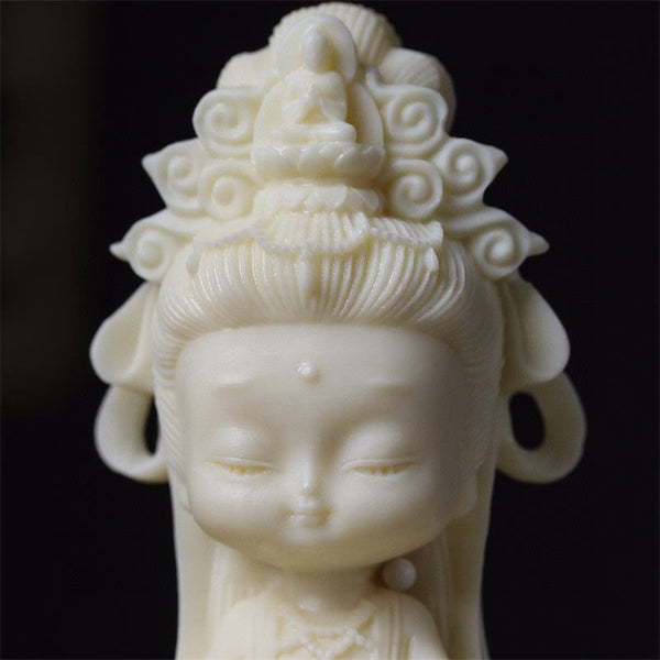 Kwan Yin Ivory Fruit Lotus Decoration - close-up headdress with Amitabha Buddha and cloud motifs, Intricate