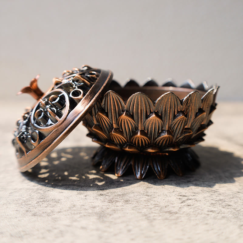 Lotus Incense Burner base and lid separated, carved bronze petals on stone, peaceful