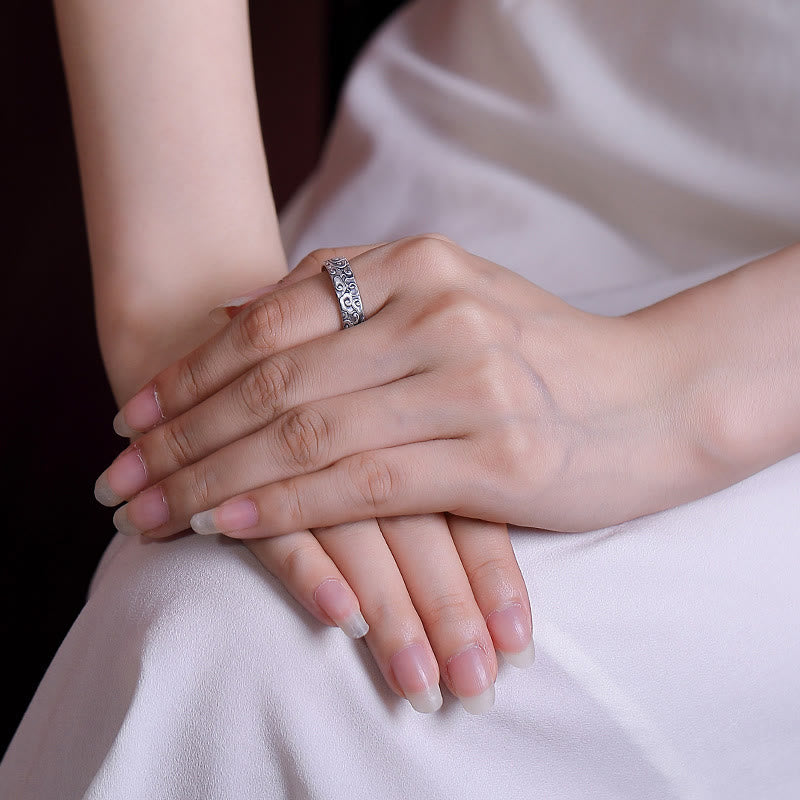 Anillo ajustable de flor de loto y ciruelo "Iluminación" de plata 999
