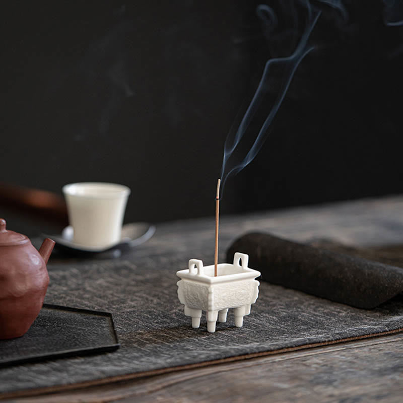 Dragon Ceramic Incense Burner – split view with hand interaction and figurine, dual function, artistic