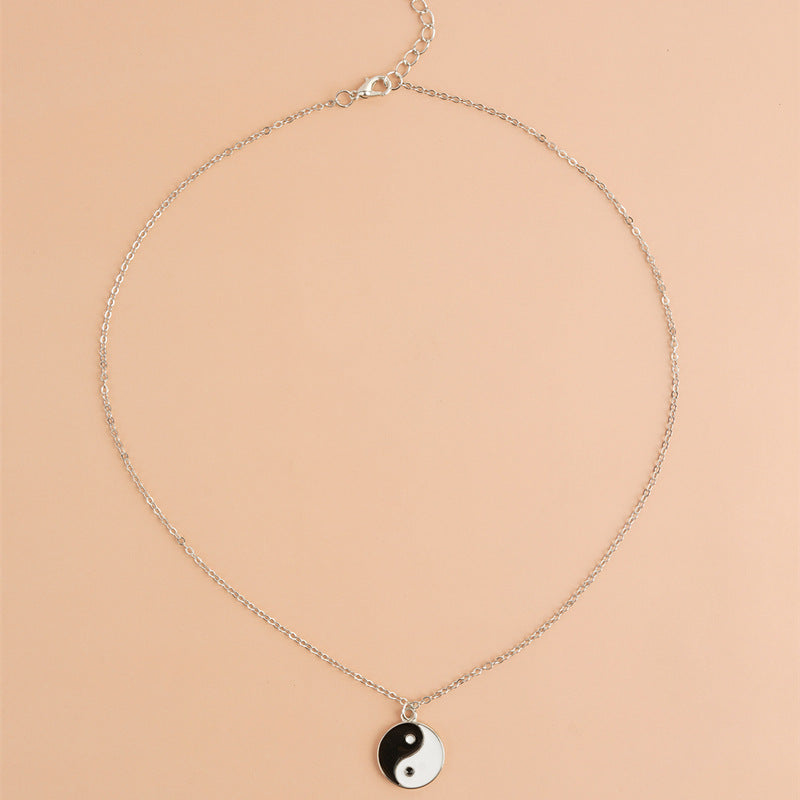 Yin Yang Pendant Necklace - Full overhead view with lobster clasp detail, yin yang