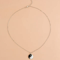 Yin Yang Pendant Necklace - Full overhead view with lobster clasp detail, yin yang