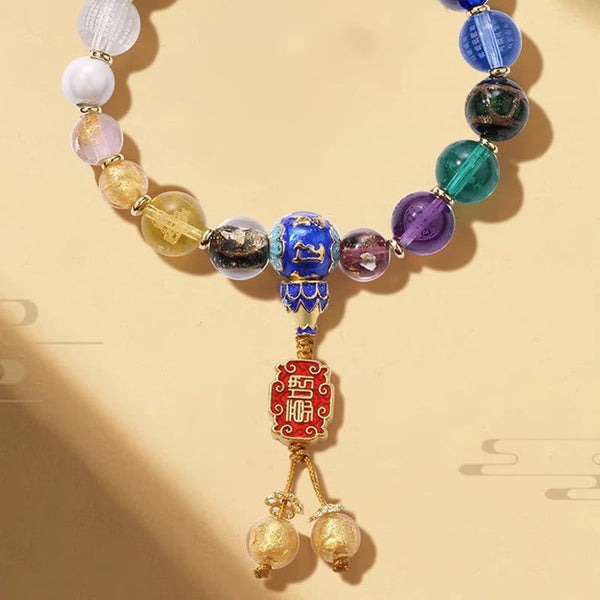 Tibetan Liuli Wrist Mala – Colorful beaded bracelet with blue enamel bead and wealth blessing charm pendant