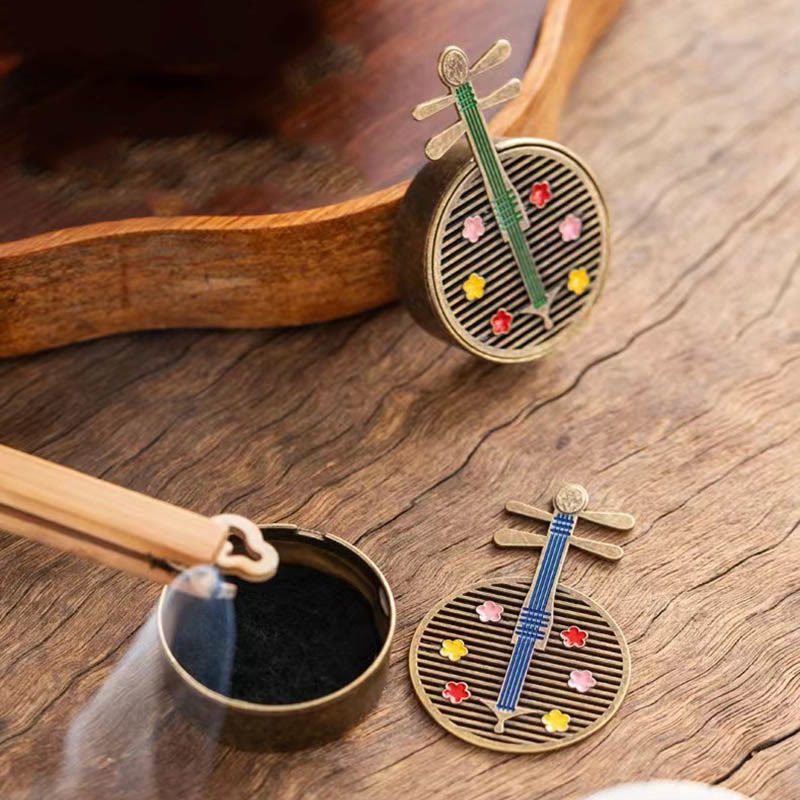 Copper Incense Burner Set – two yueqin burners in green and blue, one open with incense smoke
