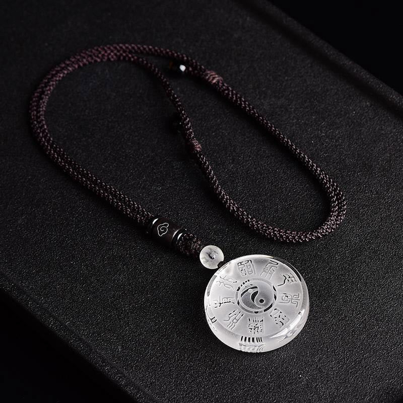 Crystal Bagua Pendant - yin-yang trigrams on transparent gemstone disc with burgundy cord, spiritual necklace