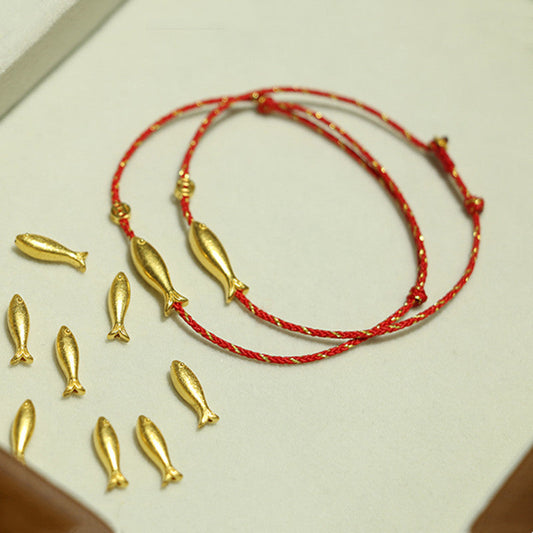 14K Gold Plated Koi Braided Bracelet – gold koi charm on red braided cord, adjustable sliding knot, luck wealth