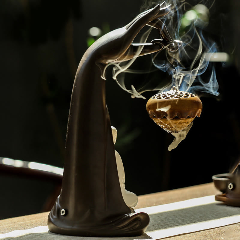 LED Buddha Hand Backflow Burner - side view with lotus censer and backflow smoke