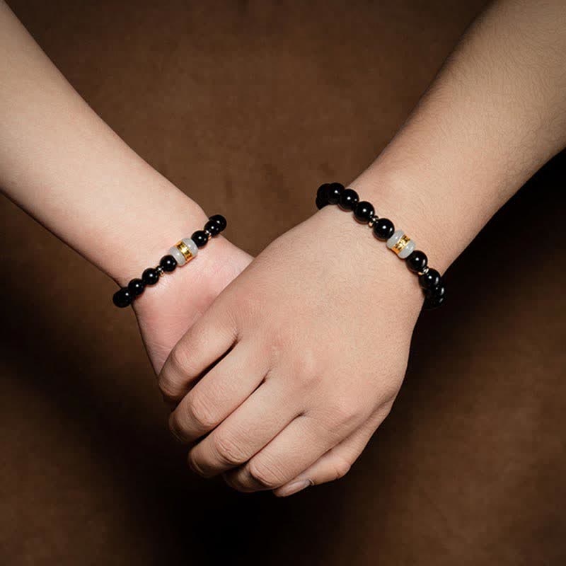 Black Obsidian Jade Bracelet – Couple holding hands wearing matching bead bracelets, romantic gift set