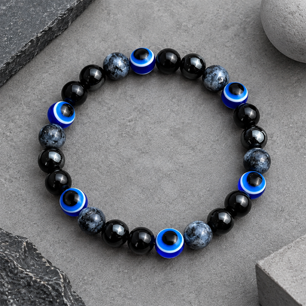 Black Magnetic Stone Evil Eye Stretch Bracelet - flat lay