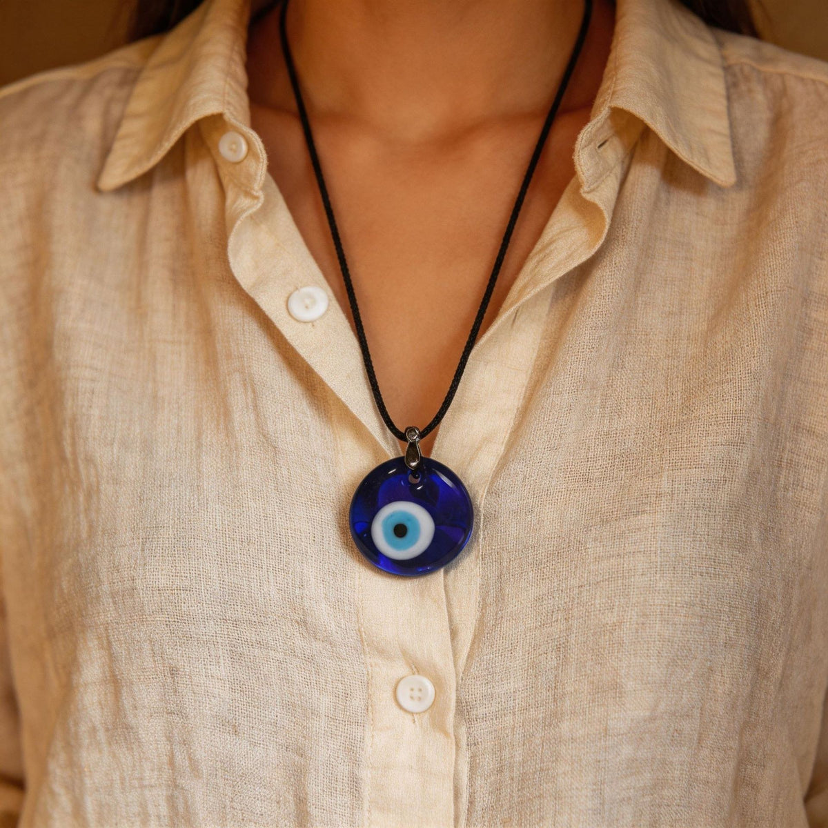 Blue Glass Evil Eye Necklace – Fifth product view of the pendant on its cord