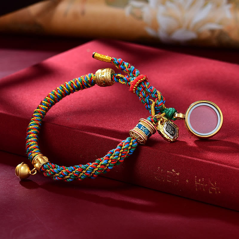Multicolor cord bracelet with decorative pendants