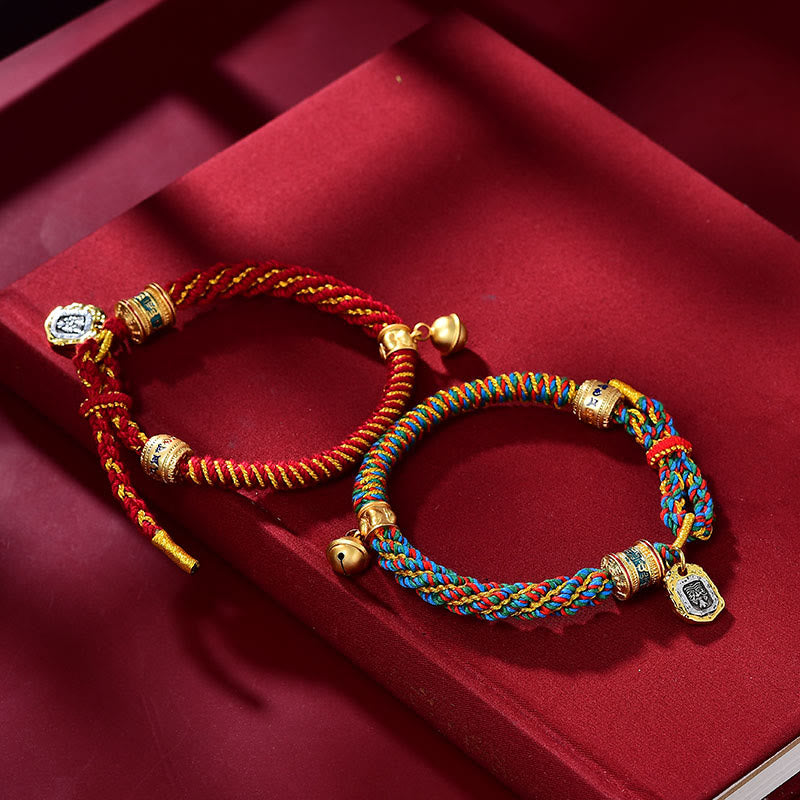 Two braided cord bracelets with decorative beads