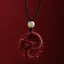 Cinnabar Hetian Jade Dragon Necklace - centered coiled dragon pendant, adjustable black cord