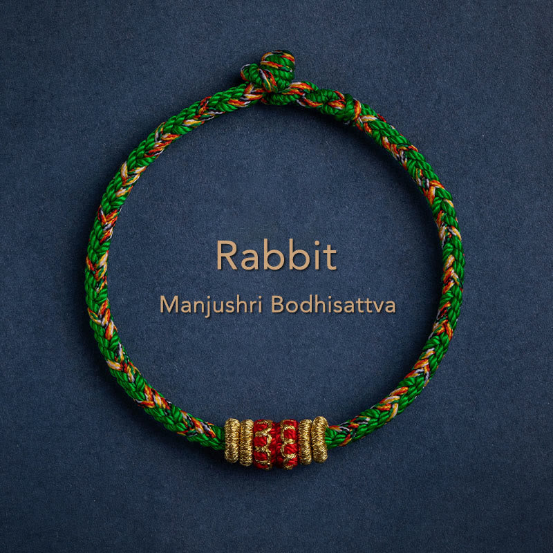 Green braided cord bracelet for Rabbit zodiac with Manjushri Bodhisattva blessing bead, gold and red center charm, adjustable Chinese knot zodiac jewelry