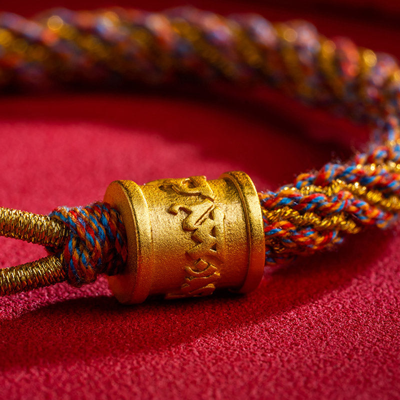 Multicolored Tibetan Om Mani Padme Hum Ruyi Braided Bracelet – Gold bead detail on red, braided bracelet