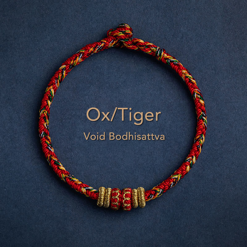 Red braided cord bracelet for Ox Tiger zodiac with Void Bodhisattva protection bead, gold accent beads, adjustable knot closure Chinese zodiac jewelry