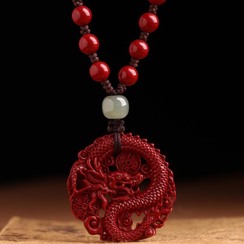 Cinnabar Hetian Jade Dragon Necklace - hand-carved dragon pendant with lucky coins, red beaded cord