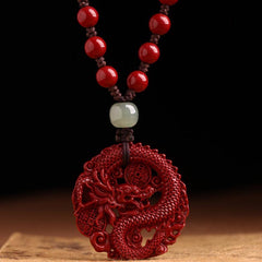 Cinnabar Hetian Jade Dragon Necklace - hand-carved dragon pendant with lucky coins, red beaded cord