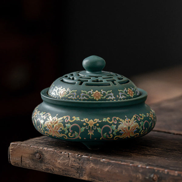 Dragon Floral Ceramic Backflow Burner – matte teal body with gold peony on dark wood, serene
