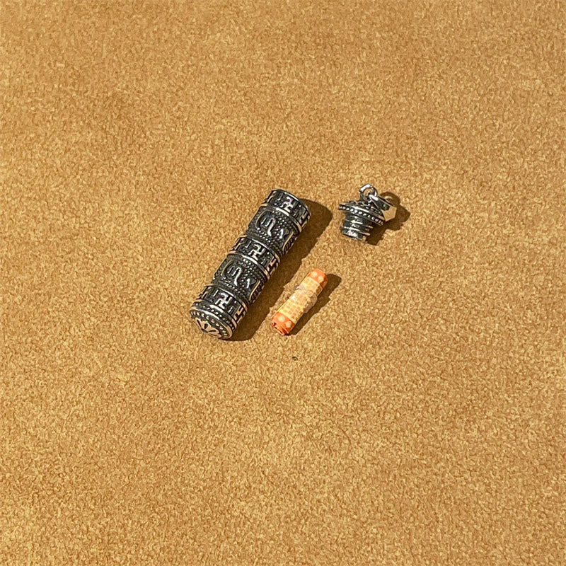 Copper Om Mani Padme Hum Necklace – Exploded view of prayer wheel pendant components with removable cap and paper mantra scroll, Buddhist amulet