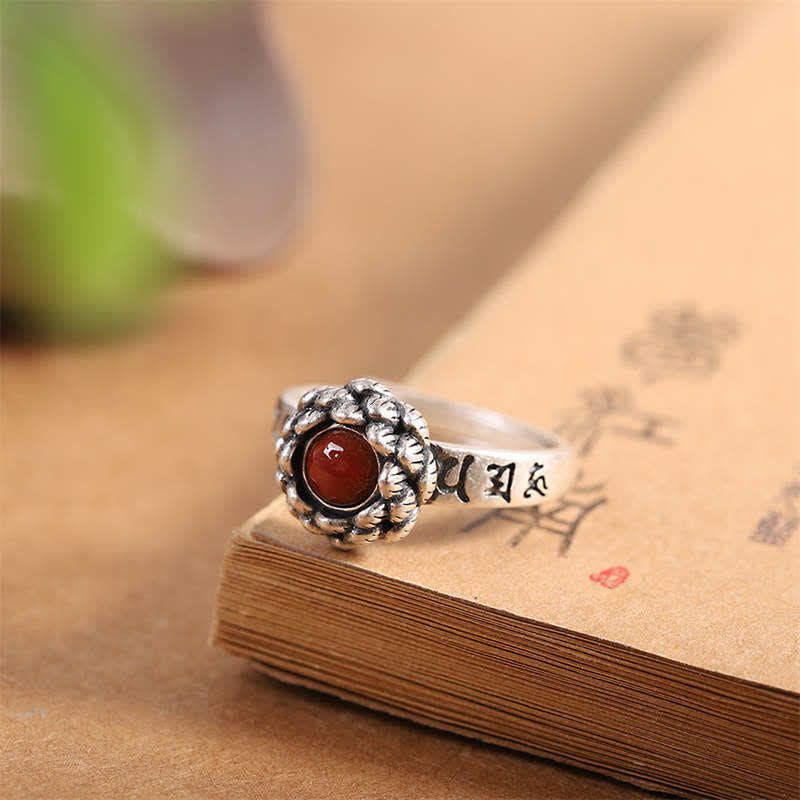 925 Silver Lotus Red Agate Ring – antique silver floral bezel with orange-red stone, engraved Sanskrit band, bohemian statement ring