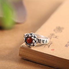 925 Silver Lotus Red Agate Ring – antique silver floral bezel with orange-red stone, engraved Sanskrit band, bohemian statement ring