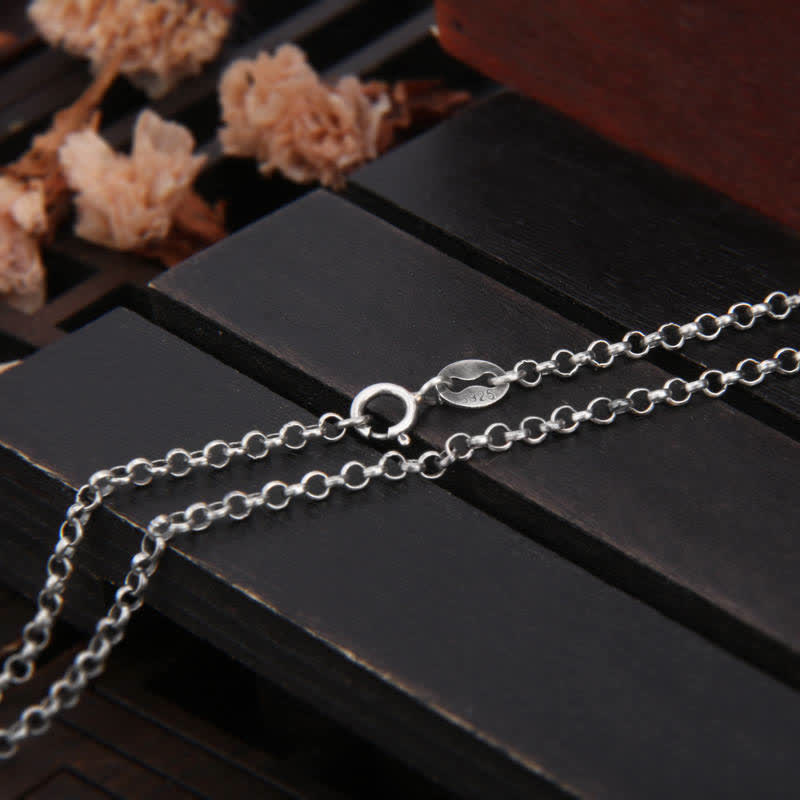 999 Silver Buddha Ghau Pendant Necklace – Size comparison with candles, meditation altar decoration