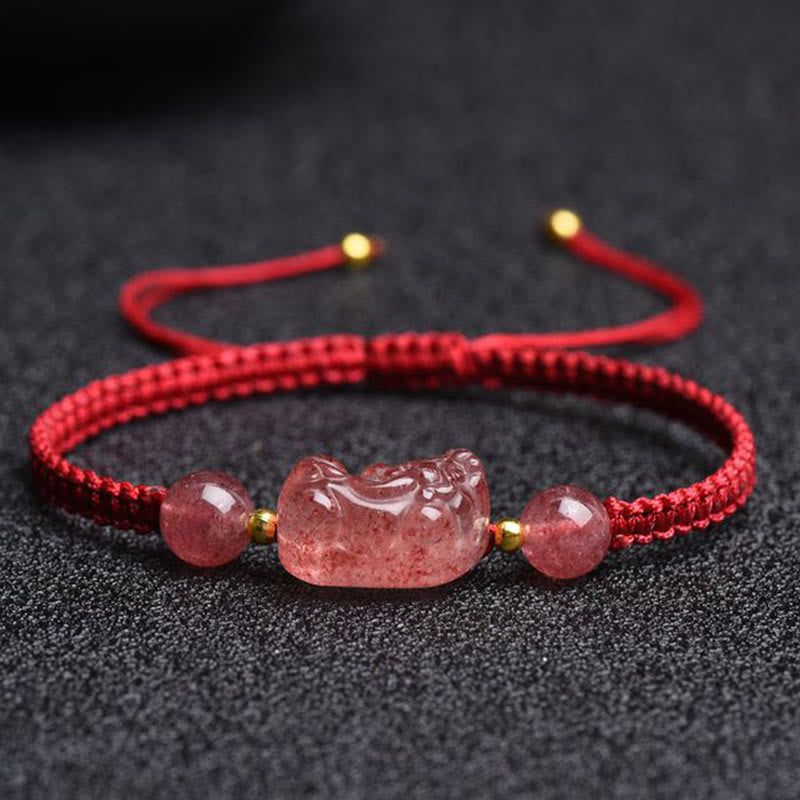 Strawberry Quartz PiXiu Red Bracelet – front close-up dark textured surface, pink PiXiu carving, love luck