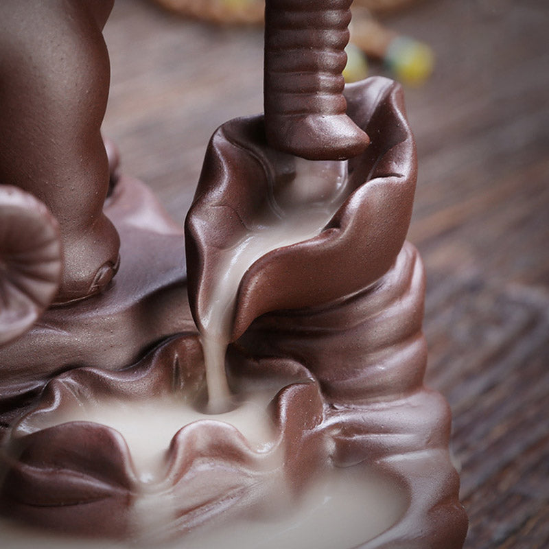 Elephant Purple Clay Incense Burner – Close-up smoke flowing down sculpted lotus leaf channels, zen decor