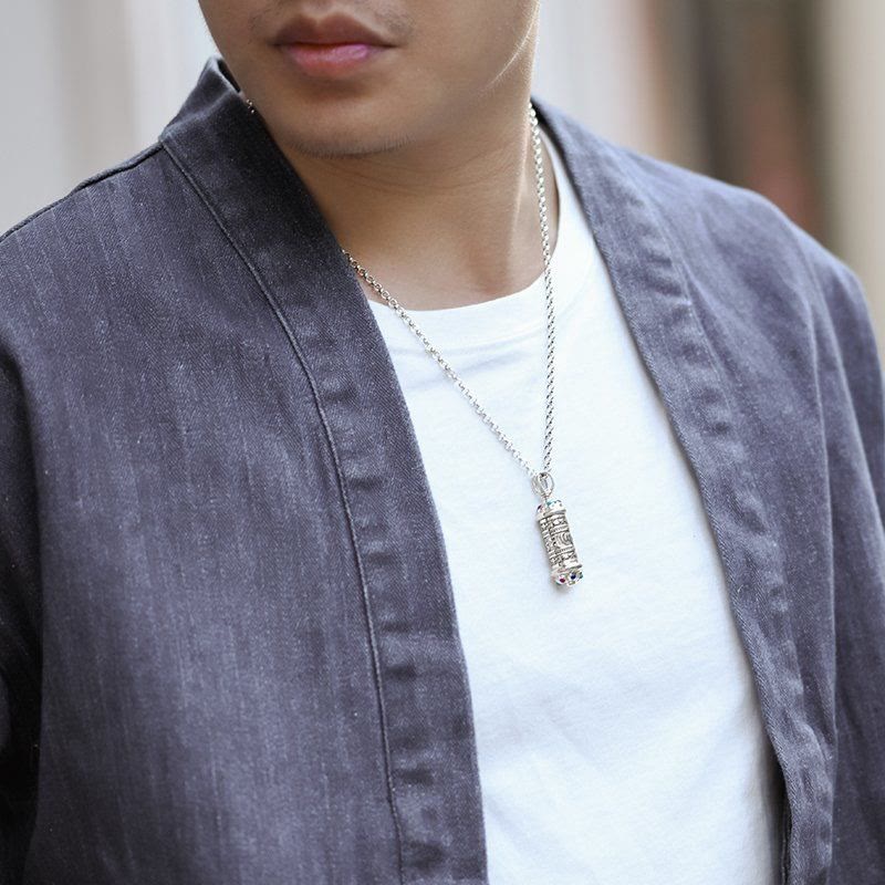 Om Mani Padme Hum Silver Necklace - Worn by model, silver Tibetan mantra pendant on chest, men's jewelry