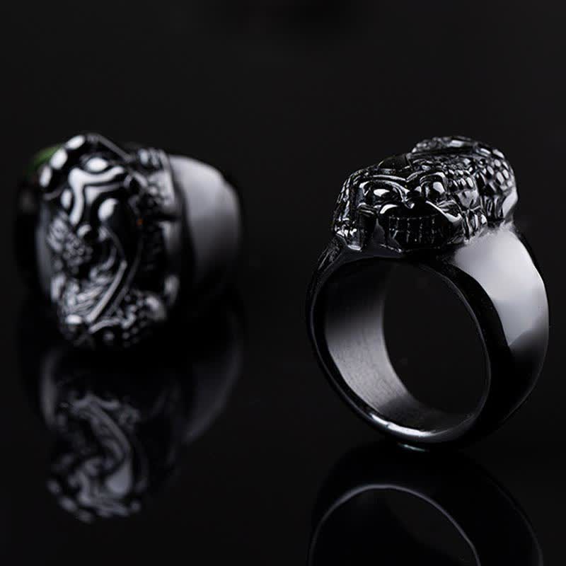 FengShui PiXiu Strength Ring – Two black pixiu rings with mirror reflection on dark surface, obsidian ring