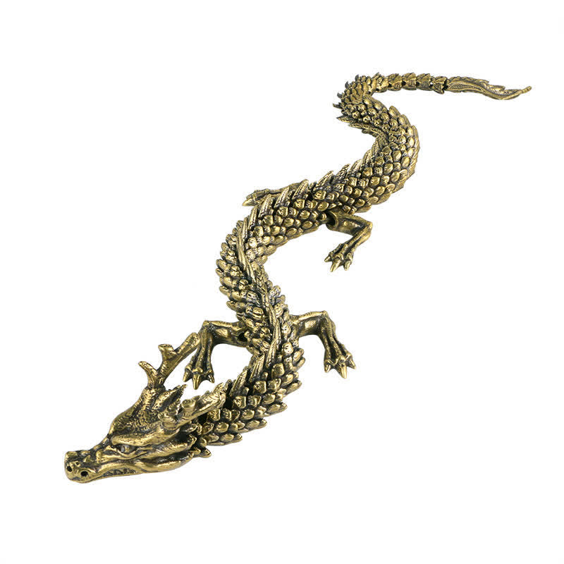 Brass Copper Dragon Statue – posed on dark book with red crystal eyes, golden finish, Luck