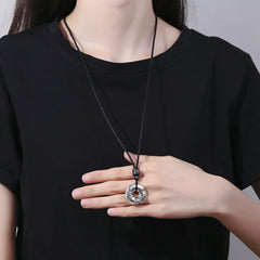 PiXiu Peace Buckle Copper Wealth Necklace – Model wearing silver PiXiu pendant with black shirt, everyday spiritual jewelry