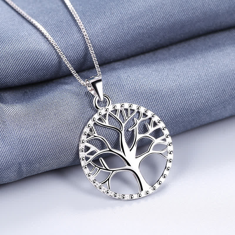 Tree of Life Sterling Silver Necklace – openwork tree pendant on blue-gray fabric, 925 silver box chain, creation pendant