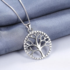 Tree of Life Sterling Silver Necklace – openwork tree pendant on blue-gray fabric, 925 silver box chain, creation pendant
