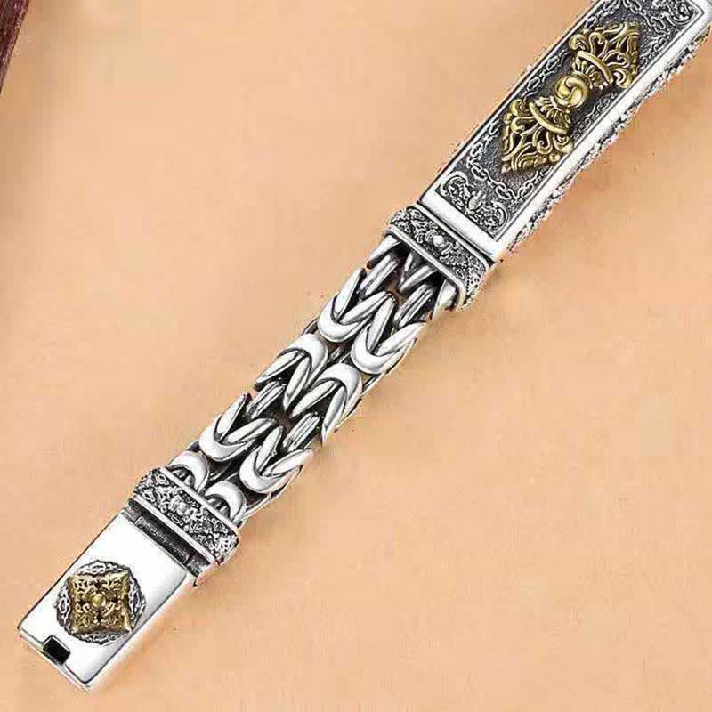 Vajra Dorje Copper Balance Bracelet - twisted braided copper chain bracelet with gold-tone crown motif centerpiece, ornate engraved plate, curb chain links, box clasp with hexagonal emblem, two-tone silver and gold