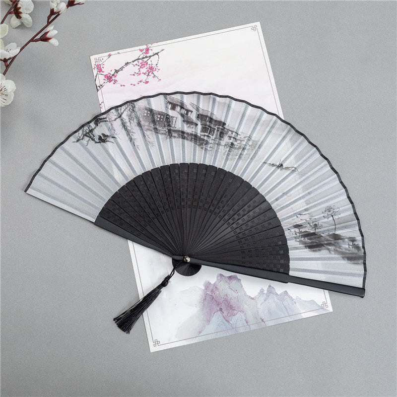 Landscape Fan White – Black fan with ink wash mountains, architecture, and lotus on white background, hand fan
