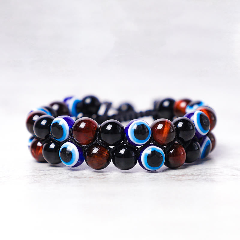 Evil Eye Hematite Tiger Eye Bracelet – double-row black amber evil eye beads three-quarter angle