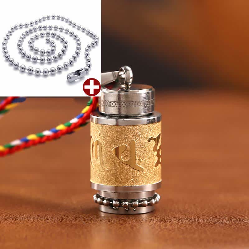 Om Mani Padme Hum Amulet – Gold finish prayer wheel, silver caps, Tibetan script, woven cord