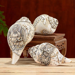 Engraved Shankha Wealth Conch – side view showing endless knot and conch spiral unity, auspicious symbol