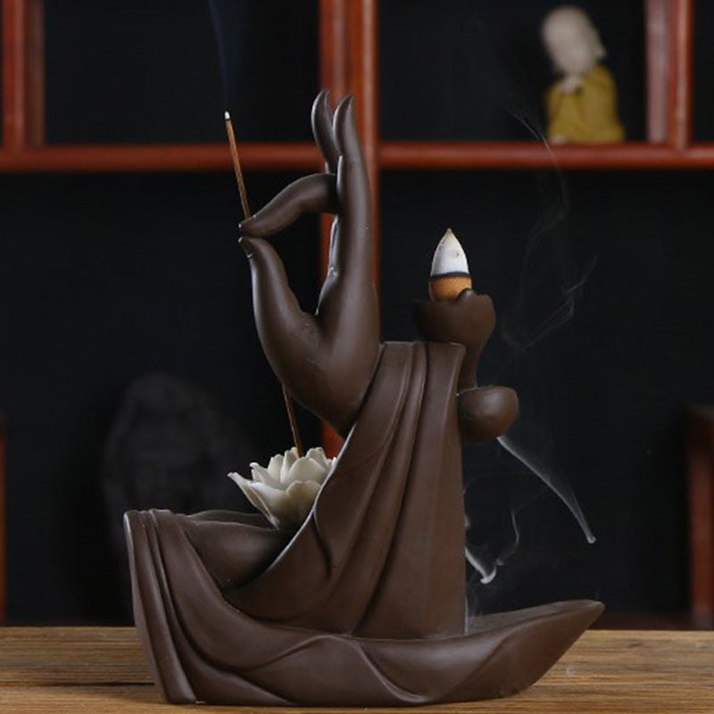 Tibetan Lotus Incense Burner – Full view with smoke cascade on white background, purple clay