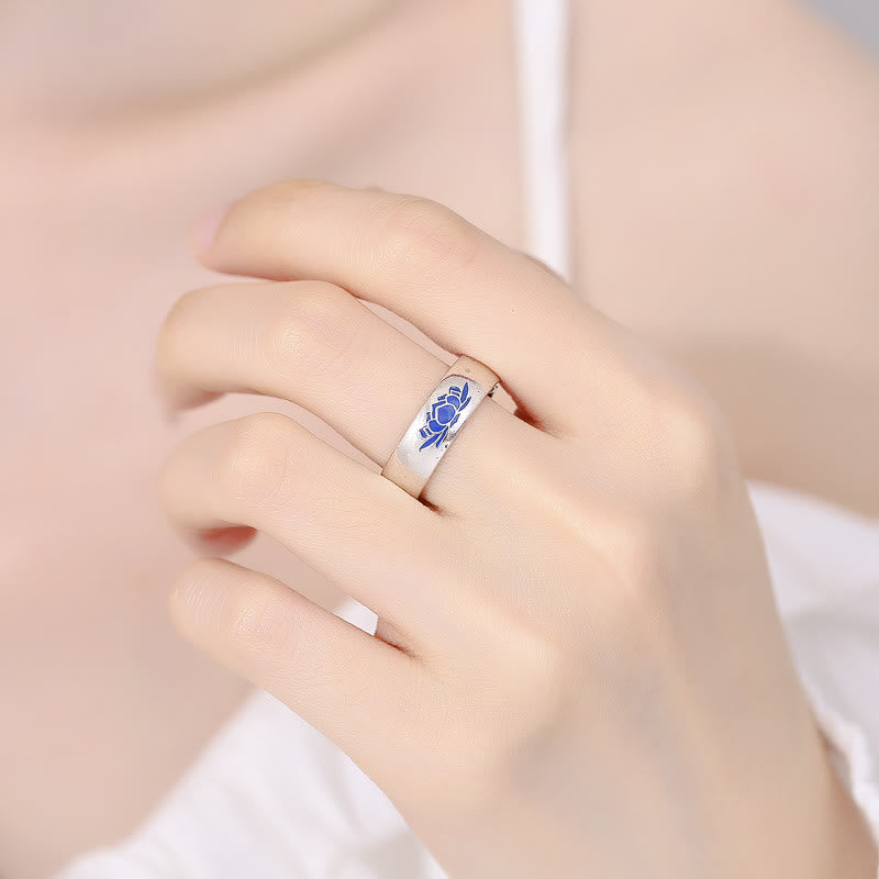 Tibetan Blue Lotus Enlightenment Ring - Worn on finger showcasing blue lotus enamel design, boho silver ring