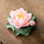 Lotus Ceramic Incense Burner - pink lotus bloom with bud and seed pod on wooden table, soft lighting