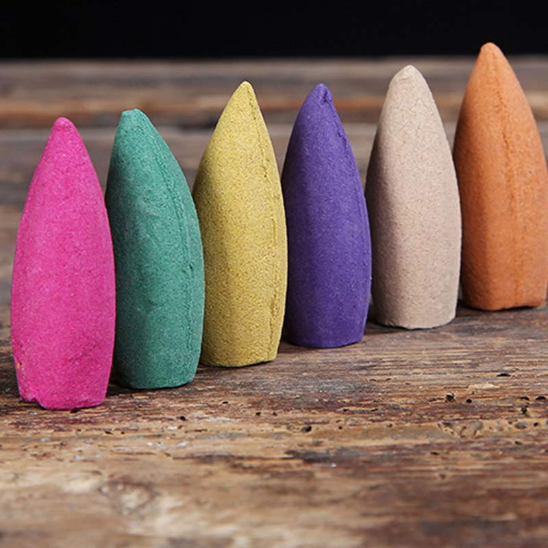 Tibetan Lotus Incense Burner – Single pink backflow cone on woven fabric, backflow cone